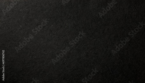 beautifull Close-up Rough, dusty and grainy of black paper texture for background photo