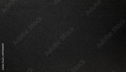 Close-up Rough, dusty and grainy black paper texture for background, flat light
