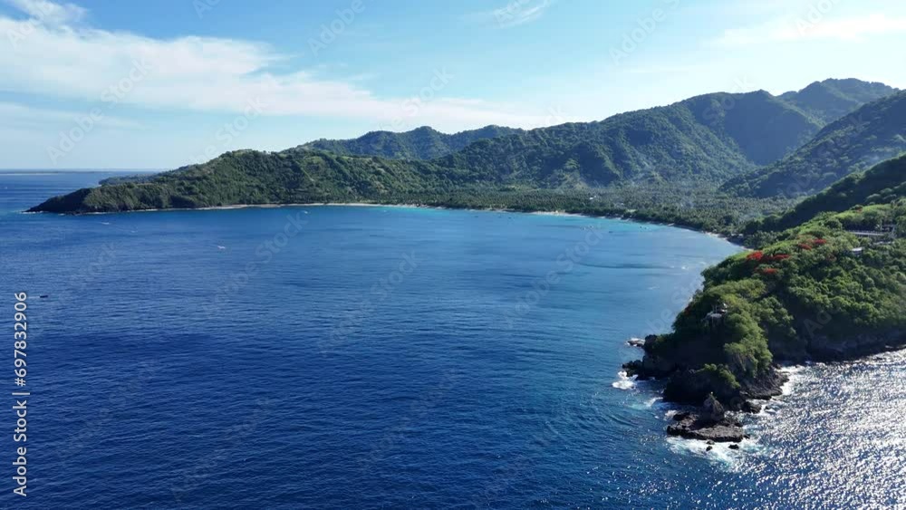 Senggigi Beach is located in Lombok. Beautiful beach with clear water and green coral Senggigi Beach is located in Lombok. Beautiful beach with clear water and green coral