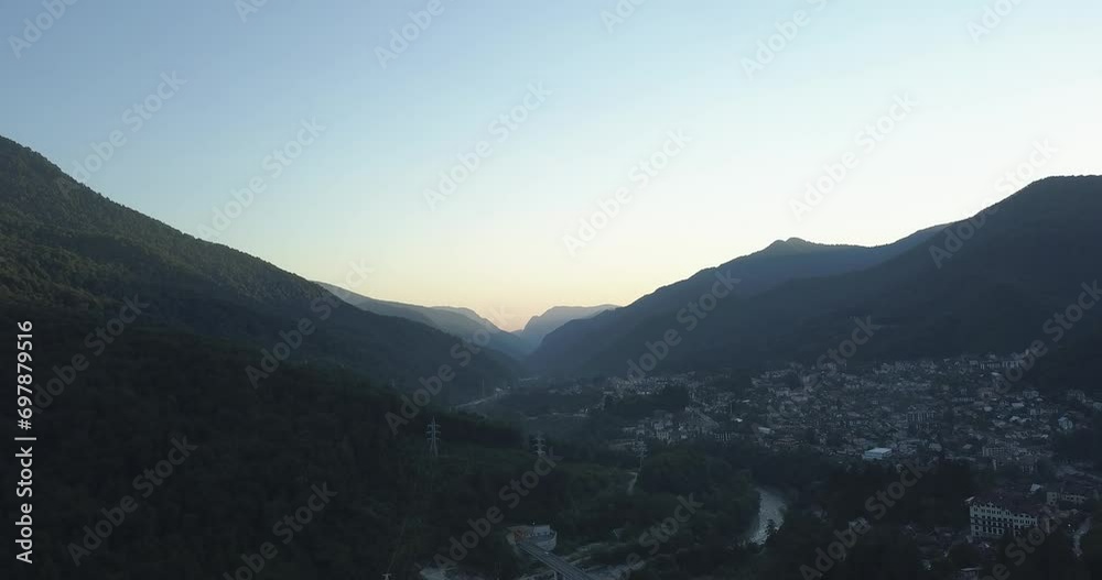 Panoramic view of Caucasus mountains ridge, Esto-Sadok and Krasnaya Polyana villages. Famous place in Sochi, Russia