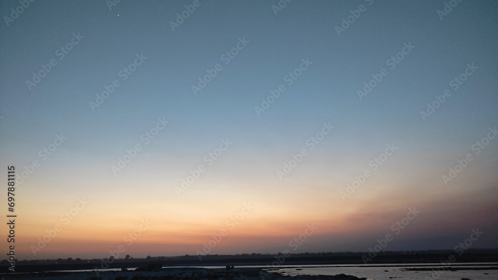 sunset over the river sunset over the river