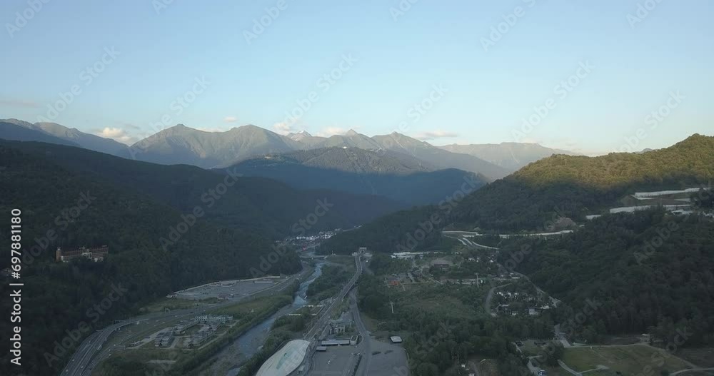 Panoramic view of Caucasus mountains ridge, Esto-Sadok and Krasnaya Polyana villages. Famous place in Sochi, Russia