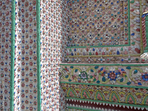 Traditional Thailand beautiful mosaic   and ornaments on decorated luxury walls of Wat Phra Kaew, Temple of the Emerald Buddha in Bangkok