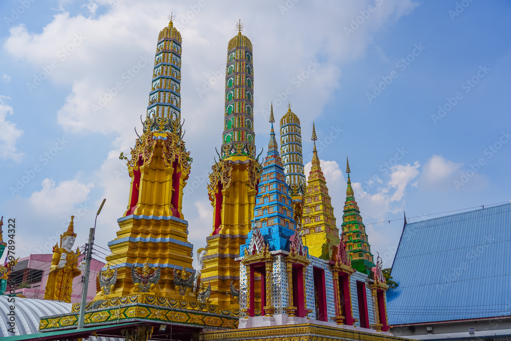 Fototapeta premium Buddhist temples in Thailand. View of traditional style roofs Waramartaya Punthasatharam Khun Chan Temple