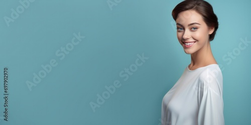 woman is smiling and posing on the blue background  generative AI