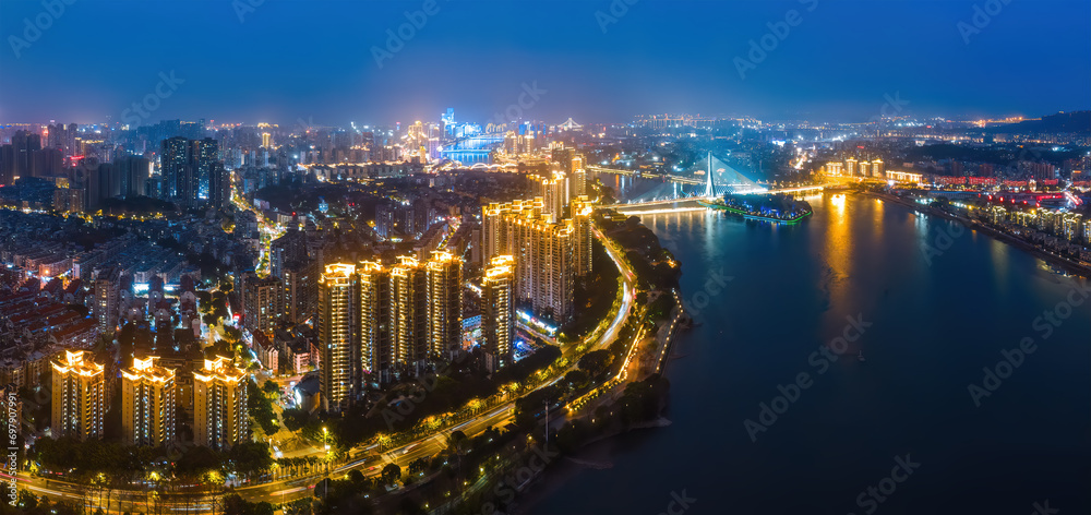 Aerial photography of the skyline of buildings along the Minjiang River in Fuzhou..