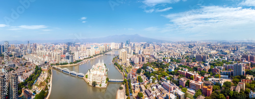 Aerial photography of the skyline of buildings along the Minjiang River in Fuzhou..