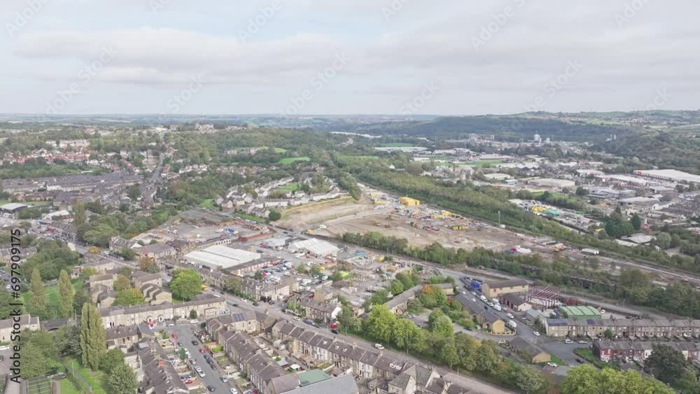 Aerial drone lifting shot over a densely populated neighborhood in Huddersfield in the UK. Aerial drone lifting shot over a densely populated neighborhood in Huddersfield in the UK.