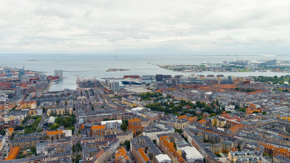 Copenhagen, Denmark. Panorama of the city center and port in cloudy weather. Summer day, Aerial View
