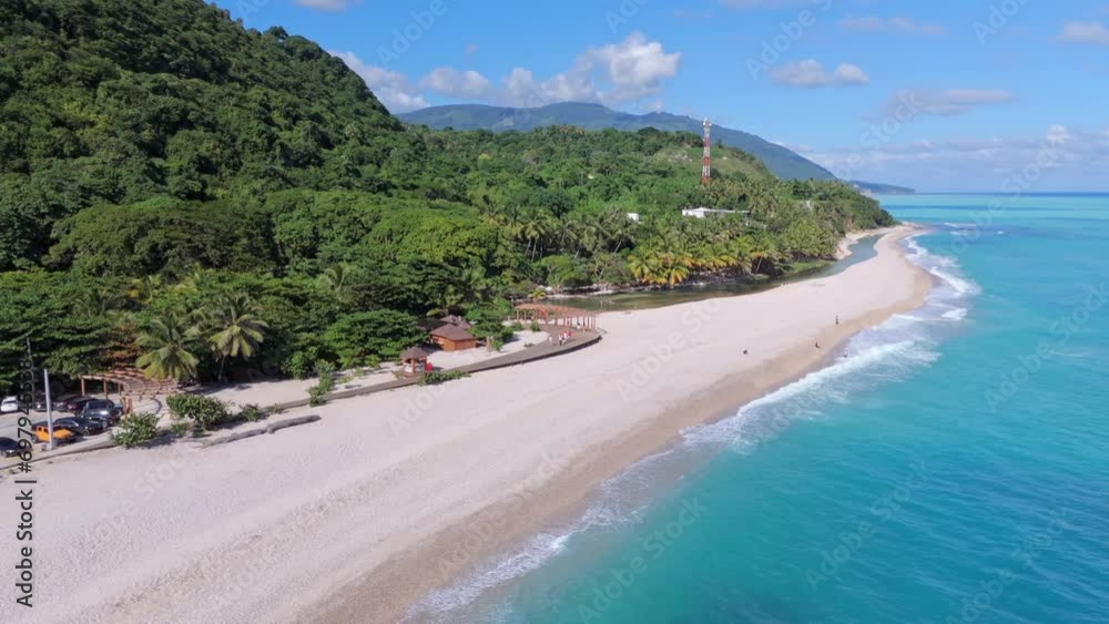 Aerial orbit shot of River Rio Los Patos and sandy beach with seascape and green hills on Dominican Republic - Wide shot Aerial orbit shot of River Rio Los Patos and sandy beach with seascape and green hills on Dominican Republic - Wide shot