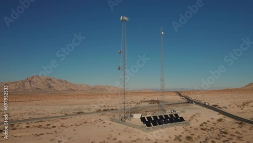 Aerial view of two communication towers in the desert