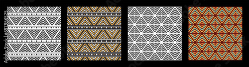 Set of four seamless tribal vector patterns. Vector seamless striped triangles patterns. Tribal ornaments. Geometric color and monochrome backgrounds.