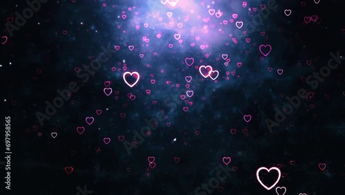 Particles draw a heart shape with falling neon hearts loop