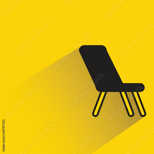 chair with shadow on yellow background