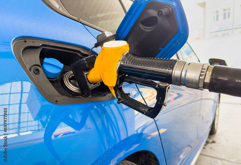Car fueling at gas station Car fueling at gas station