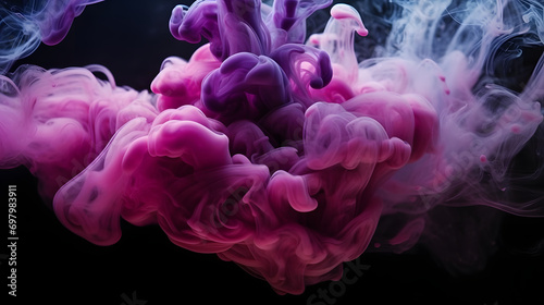 purple and blue colors mixing, smoke effect in water. Thick colorful smoke purple, pink, red, blue on a black isolated background
