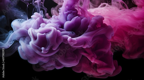 purple and blue colors mixing, smoke effect in water. Thick colorful smoke purple, pink, red, blue on a black isolated background