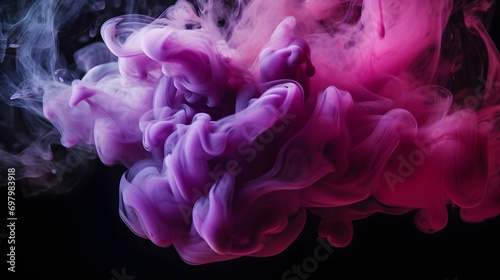 purple and blue colors mixing, smoke effect in water. Thick colorful smoke purple, pink, red, blue on a black isolated background