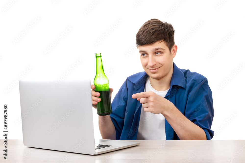 Young Man with a Beer and Laptop Young Man with a Beer and Laptop