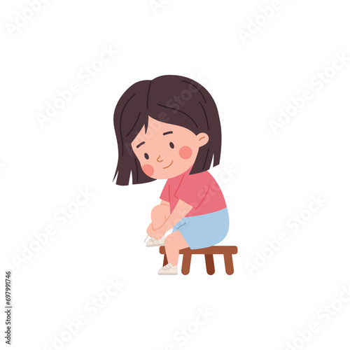 Little girl putting on shoes while sitting on a stool, cartoon vector