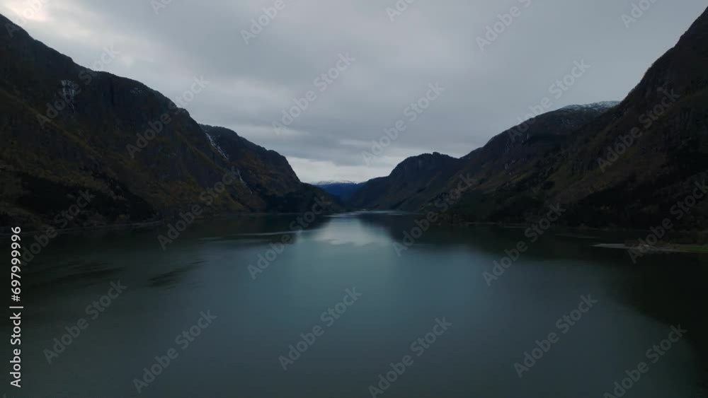 aerial cinematic view over Sandvevatn lake in norwegian mountains druing morning aerial cinematic view over Sandvevatn lake in norwegian mountains druing morning