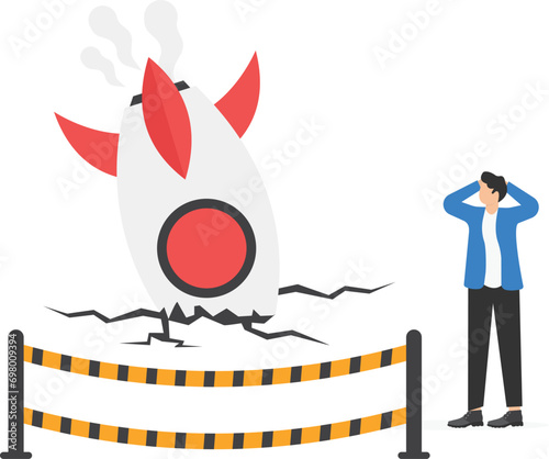 Fail start up business, new business risk or unexpected entrepreneur bankruptcy concept, depressed businessman company owner stand on crash launching space rocket metaphor of new business failure.

