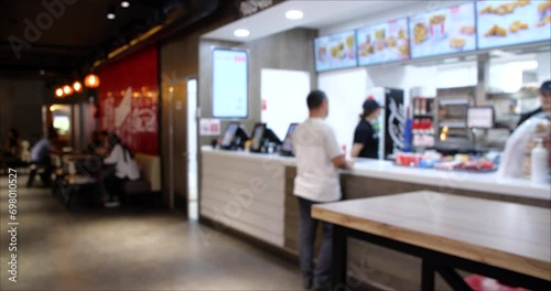 Time Lapse video of People Ordering from the Fast Food restaurant. Blurred background 4K video