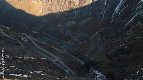 aerial view over trollstigen trolls ladder path road and bridge over stigfossen waterfall in norway mountains photo