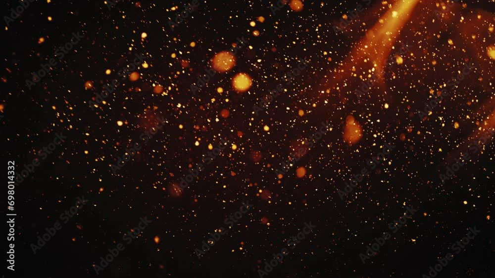 Golden bright particles create a beautiful holiday background
