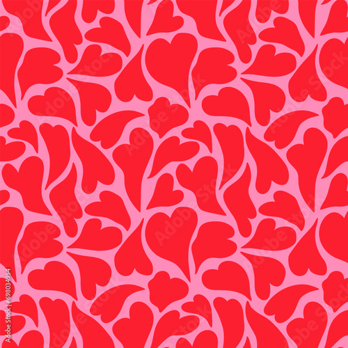 Melting red love heart seamless pattern on pink background. Vector curve hearts repeat print for Valentines day.