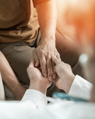 Parkinson disease patient, Alzheimer elderly senior, Arthritis person's hand in support of geriatric doctor or nursing caregiver, for disability awareness day, ageing society care service