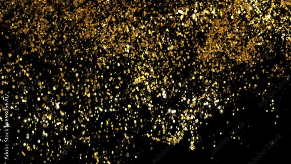 golden glitter particles moving and explosion on black background golden glitter particles moving and explosion on black background