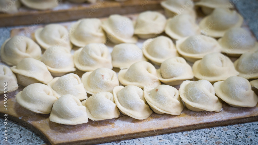 Homemade handmade dumplings close-up. Selective Focus, Tinted Image, Healthy Food Concept. Homemade handmade dumplings close-up. Selective Focus, Tinted Image, Healthy Food Concept.