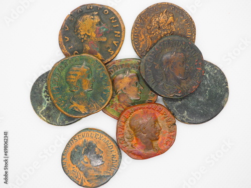 Sestertii, currency of the Roman Empire on a white background. photo