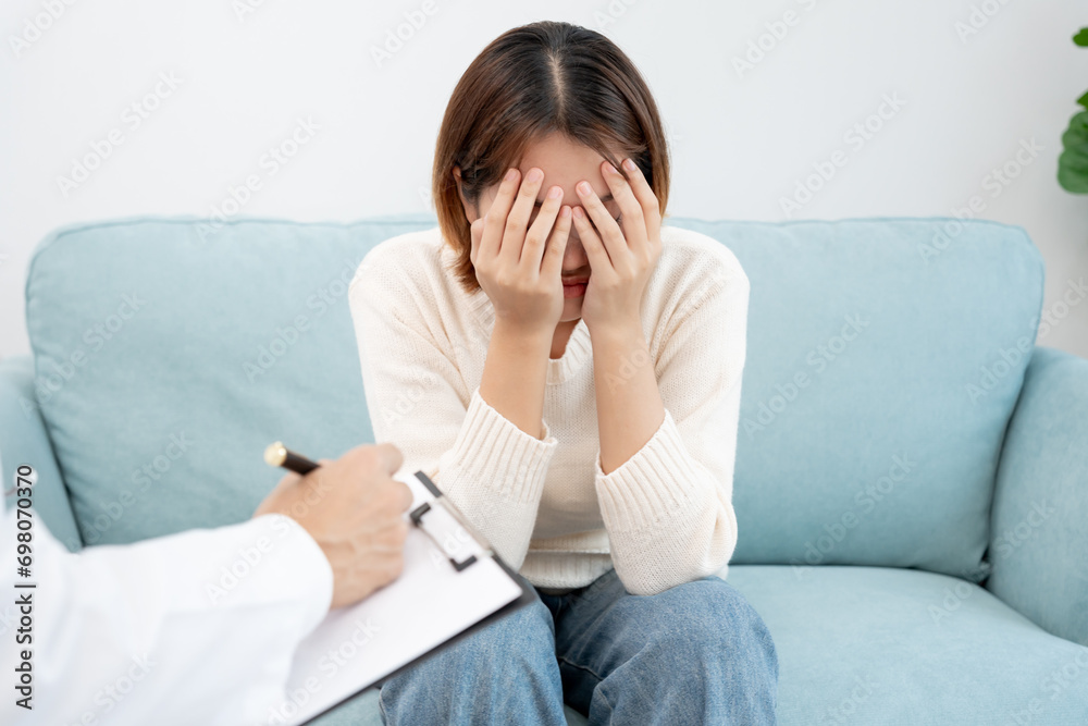 woman with mental health problems is consulting. psychiatrist is recording the patient's condition for treatment. encouragement, love and family problem, bipolar , depression patient, protect suicide woman with mental health problems is consulting. psychiatrist is recording the patient's condition for treatment. encouragement, love and family problem, bipolar , depression patient, protect suicide