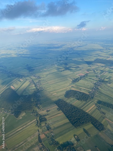 view from plane over europe blue sky