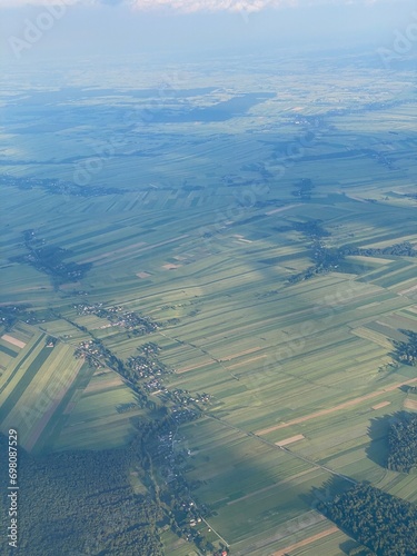 view from plane over europe blue sky