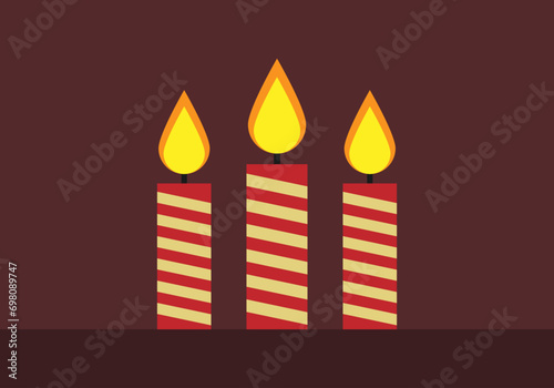 Velas de color rojo y dorado de navidad.
