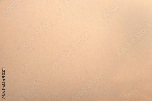 beige cardboard background texture with paper fibers