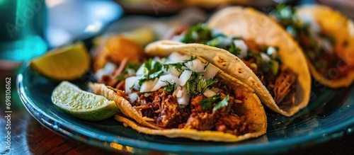 Four Tacos served on a plate photo