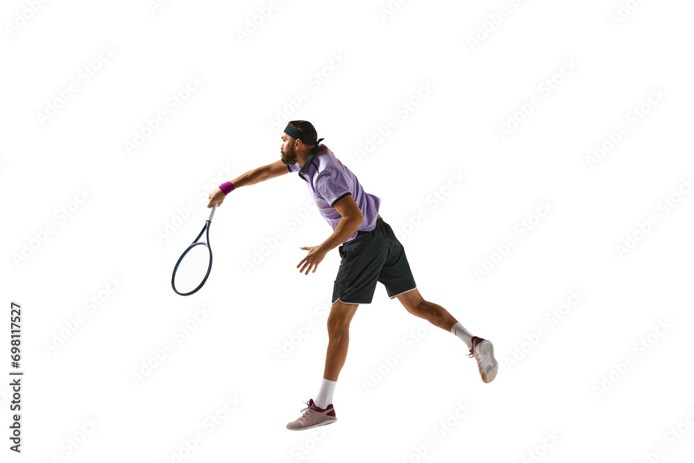 Competitive athletic man, tennis player during game in motion with racket, playing isolated over white background. Concept of professional sport, movement, competition, action. Ad