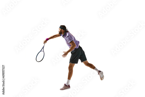 Competitive athletic man, tennis player during game in motion with racket, playing isolated over white background. Concept of professional sport, movement, competition, action. Ad