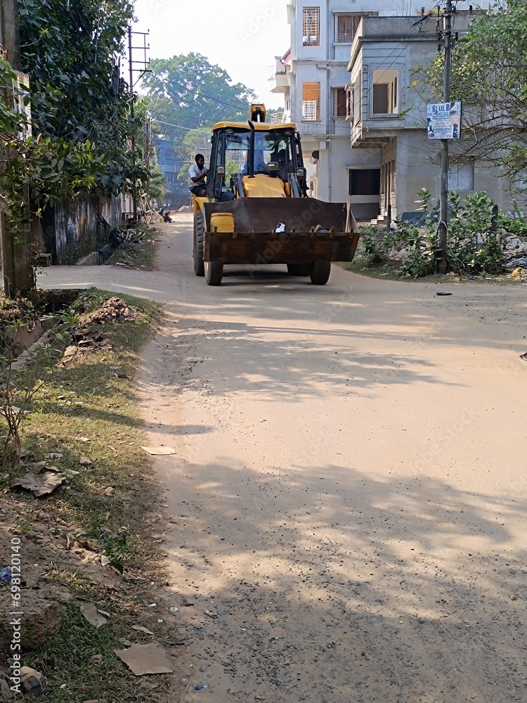 Buldozer in road for building work.