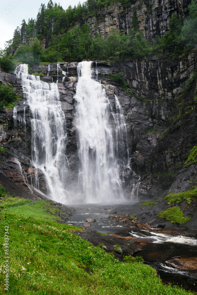 waterfall in the forest in norway