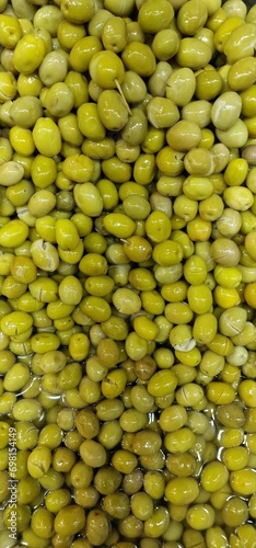 Lots of small green olives