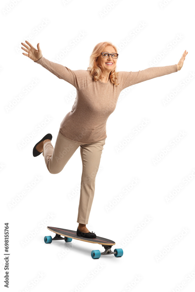 Mature woman riding a skateboard and spreading arms Mature woman riding a skateboard and spreading arms