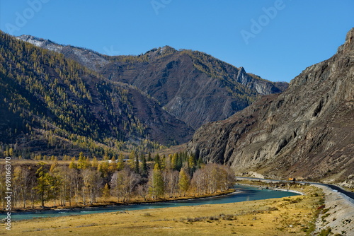 Russia. The South of Western Siberia, Altai Mountains. Only in the middle of autumn, when the mountain glaciers stop melting, the water in the Katun River becomes transparent and rich turquoise color.