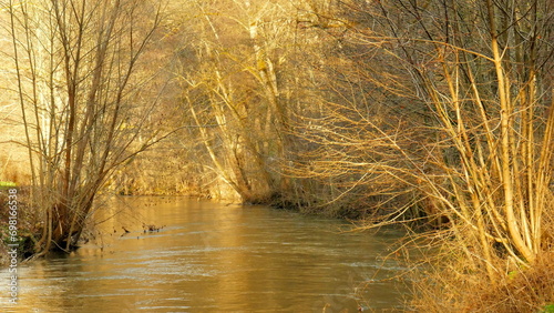 romantischer Fluss Nagold im Schwarzwald bei malerischem Sonnenuntergang photo