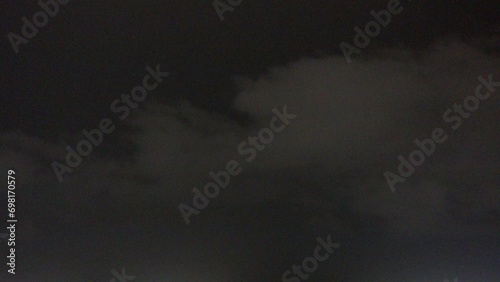 Clouds At Night During Lightning Rainstorm Closeup photo