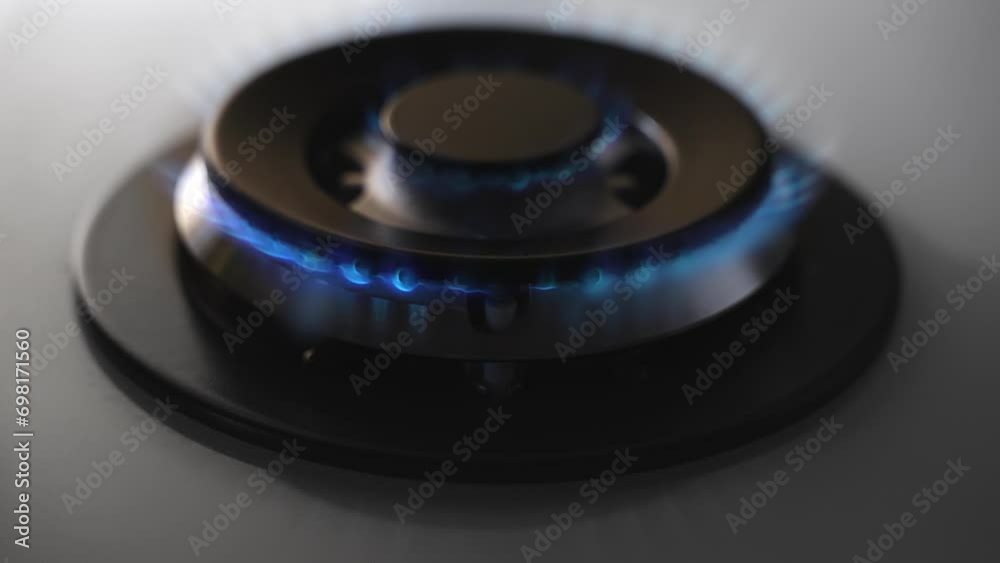 Closeup of a gas burner. Lighting a gas stove and turning it off. Closeup of a gas burner. Lighting a gas stove and turning it off.